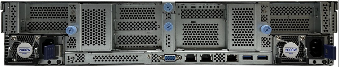 Figure: IBM Storage Scale System Utility Node rear view Rear panel photograph of the IBM Storage Scale System Utility Node showing two redundant 2000W 96% efficient power supplies at the left and right edges, four numbered PCIe adapter slots (slots 1 through 4) in the center, a VGA port, two USB 3.0 ports, and two RJ45 management Ethernet ports in the lower-center area